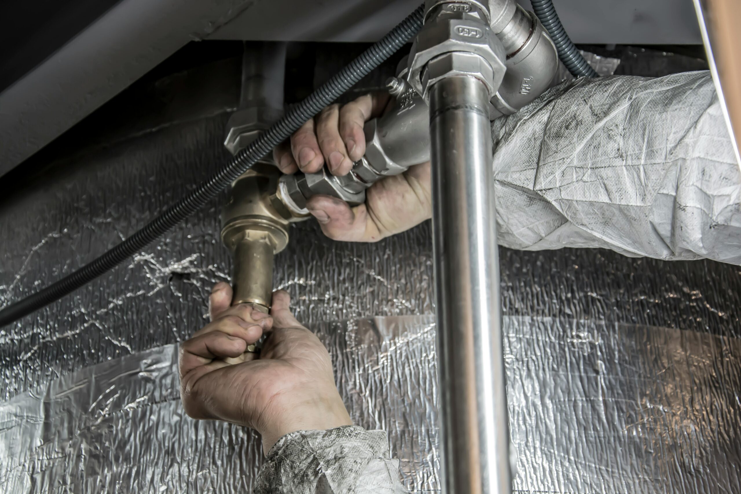 Photo by Anıl Karakaya: https://www.pexels.com/photo/plumber-installs-pipe-fittings-6419128/